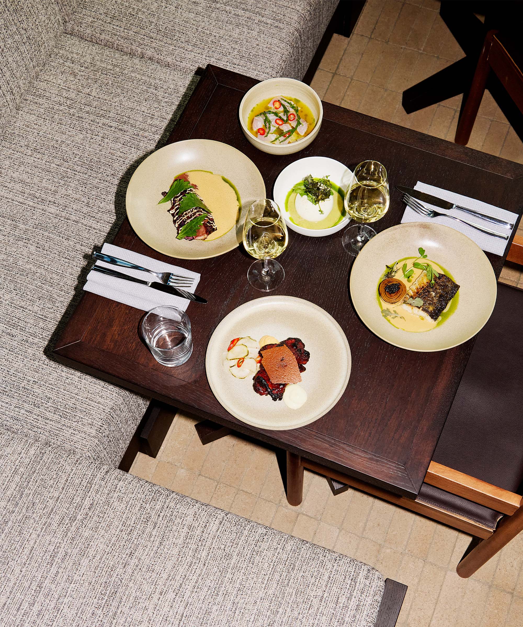 3-course menu at Barossa — Peruvian roots, waterfront views, and open-fire cooking at the NDSM harbor